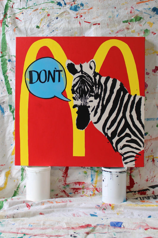 "Original painting 'DON'T' by Let Z Be Studio. Vibrant pop art featuring a bold zebra with a speech bubble saying 'DON'T,' against a striking red and yellow background."
