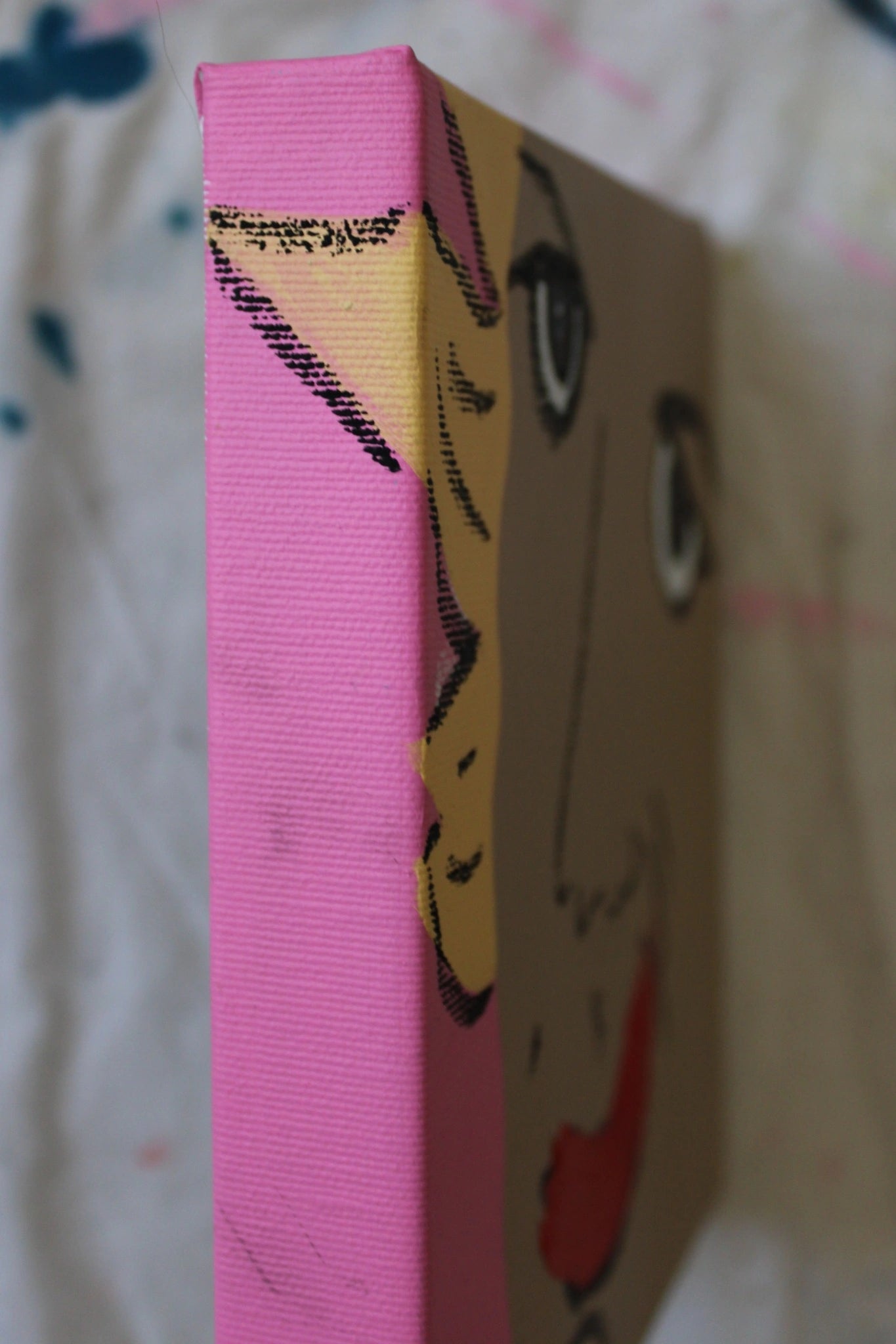"Side view of 'Smile No.4' by Liya Ella Raspberry for Let Z Be — original pop art painting with pink background, acrylic on canvas from Fake or Real collection."